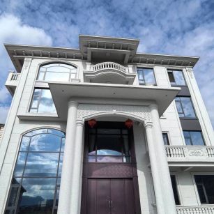 伊春白麻别墅外墙干挂石材效果示例