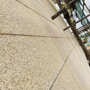 伊春 黄金麻花岗岩荔枝面外墙干挂石材效果示例