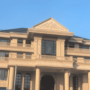 伊春黄金麻别墅外墙干挂石材效果示例