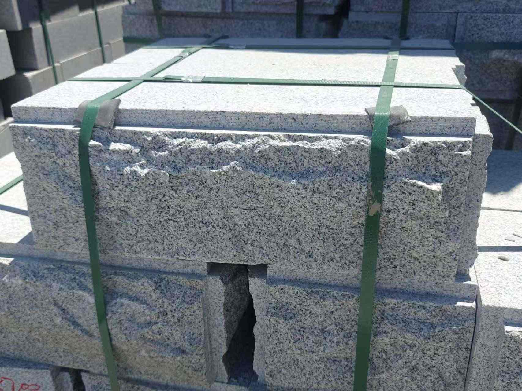 伊春 芝麻白花岗岩自然面成品