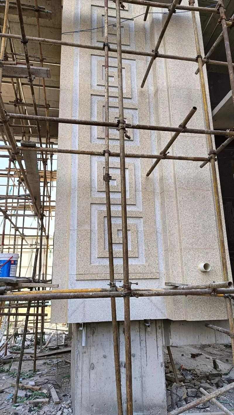 伊春 黄金麻花岗岩别墅外墙干挂回纹造型效果